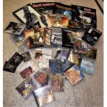 A box containing a collection of various IRON MAIDEN ephemera including VHS videos "Life After