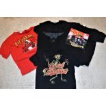 A collection of four various band t-shirts including SAXON "Castle Donnington 1980-2012", DEF