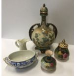 A collection of Royal Worcester comprising a squat vase with floral decoration on a green and yellow