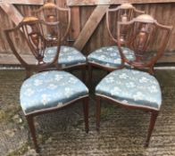 A set of four Edwardian mahogany and inlaid shield back salon chairs by Blyth & Sons of 4 Chiswell