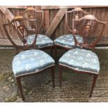 A set of four Edwardian mahogany and inlaid shield back salon chairs by Blyth & Sons of 4 Chiswell