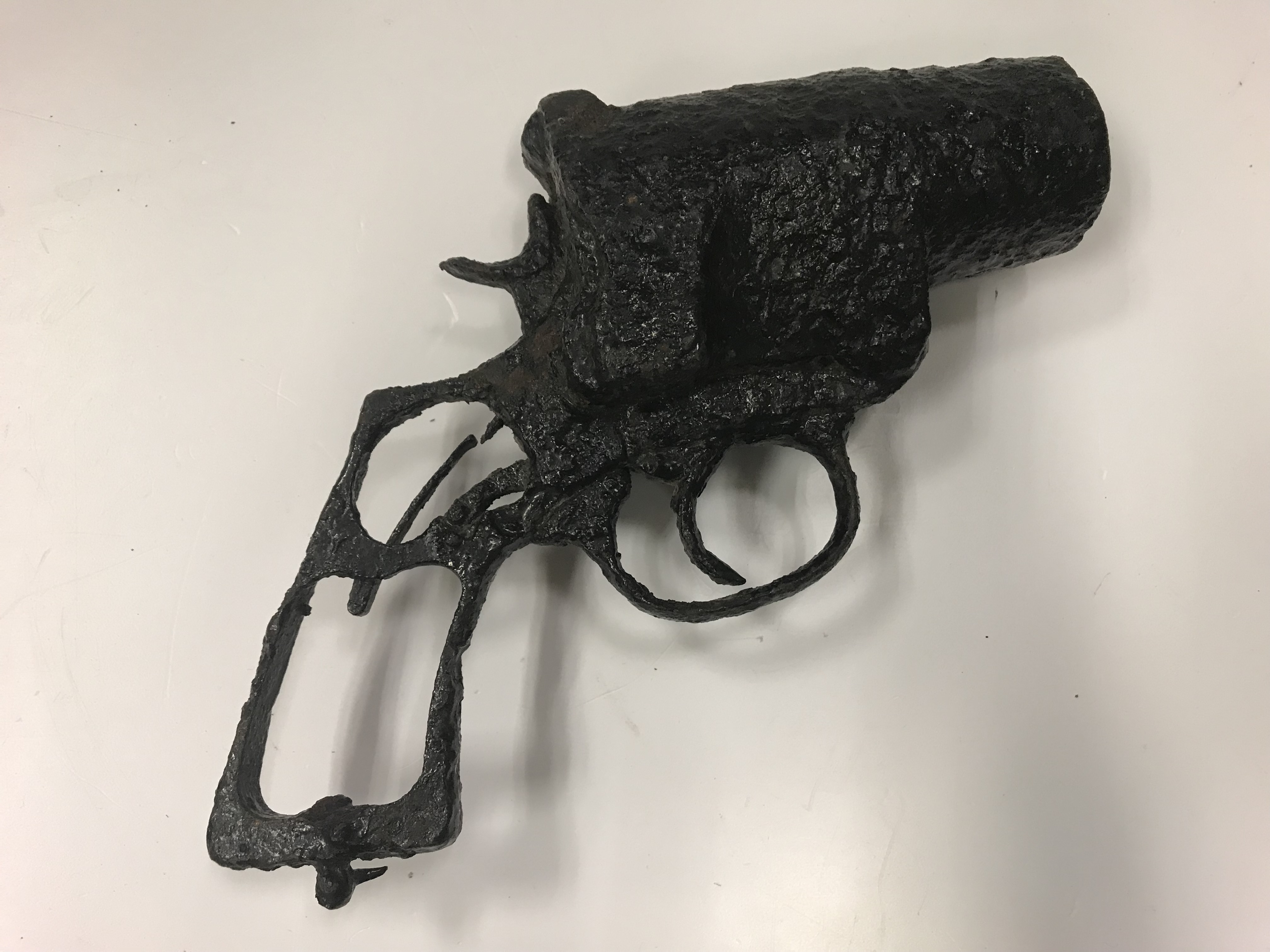 A World War I flare gun, possibly Webley & Scott, very corroded/non-functioning 21 cm in length