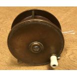 An Oakes & Co. Limited of Madras 3½" bronze plate wind salmon fly reel 8.8 cm