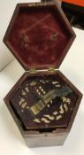 A 19th Century rosewood Lachenal & Co forty-eight button concertina No'd 39113 housed in a