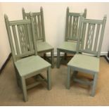A set of four modern green painted panel-seated hall chairs