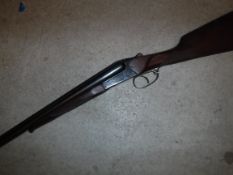 A Baikal Model 43EM 12 bore shotgun, double barrel, side by side, box lock ejector, 27.5" barrels (