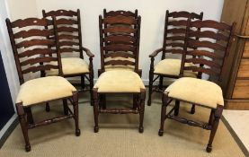A modern set of six ladder back dining chairs with upholstered seats (4 plus 2), the carvers 108