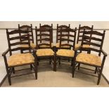 A set of eight late 20th Century oak ladder back dining chairs in the North Country style, on turned
