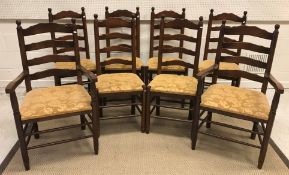 A set of eight late 20th Century oak ladder back dining chairs in the North Country style, on turned