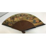A collection of four various fans to include a bamboo and painted example depicting pansy heads on