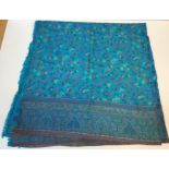 A modern wool and silk mix rectangular shawl with Paisley style design on a blue ground, approx