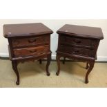Two pairs of modern Chinese hardwood two drawer bedside chests of serpentine form, raised on