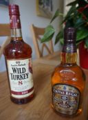 Two bottles of whisky - Chivas Regal 12 year old blended Scotch whisky and Austin Nichols Wild