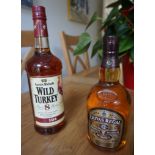 Two bottles of whisky - Chivas Regal 12 year old blended Scotch whisky and Austin Nichols Wild