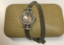 A ladies platinum cased wristwatch, the