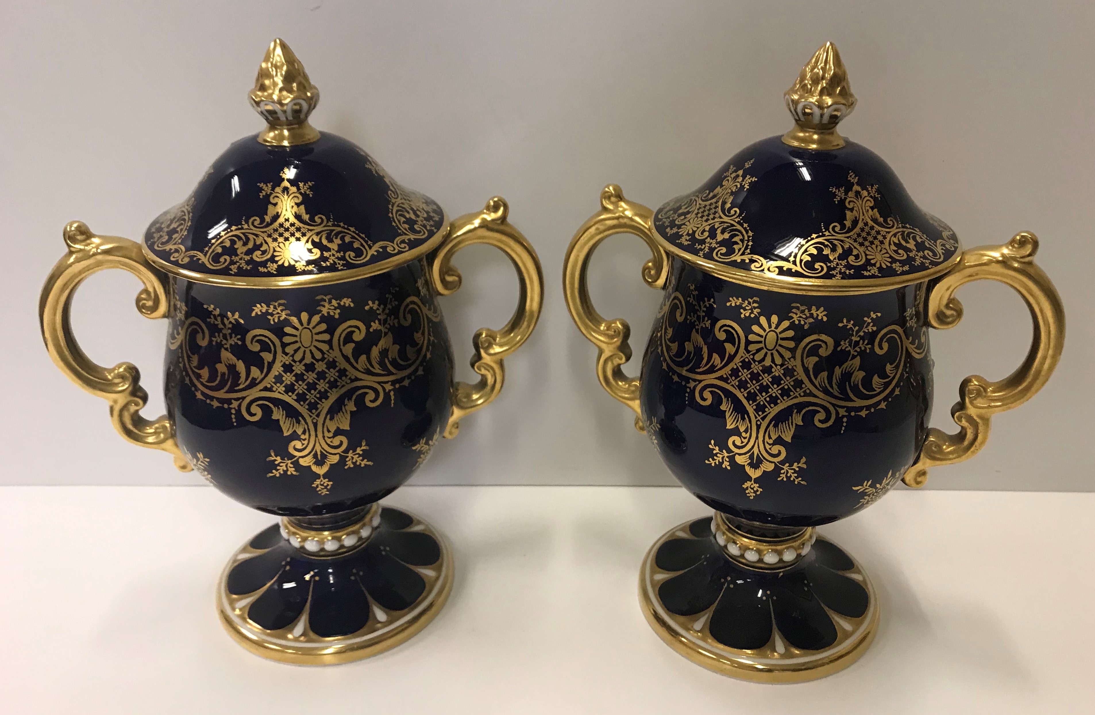 A pair of Coalport bleu royale and gilt