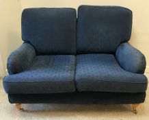 A pair of modern blue upholstered two se