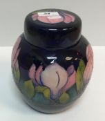 A Moorcroft ginger jar and cover, blue g