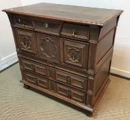 A 17th Century oak and walnut chest, the