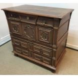 A 17th Century oak and walnut chest, the