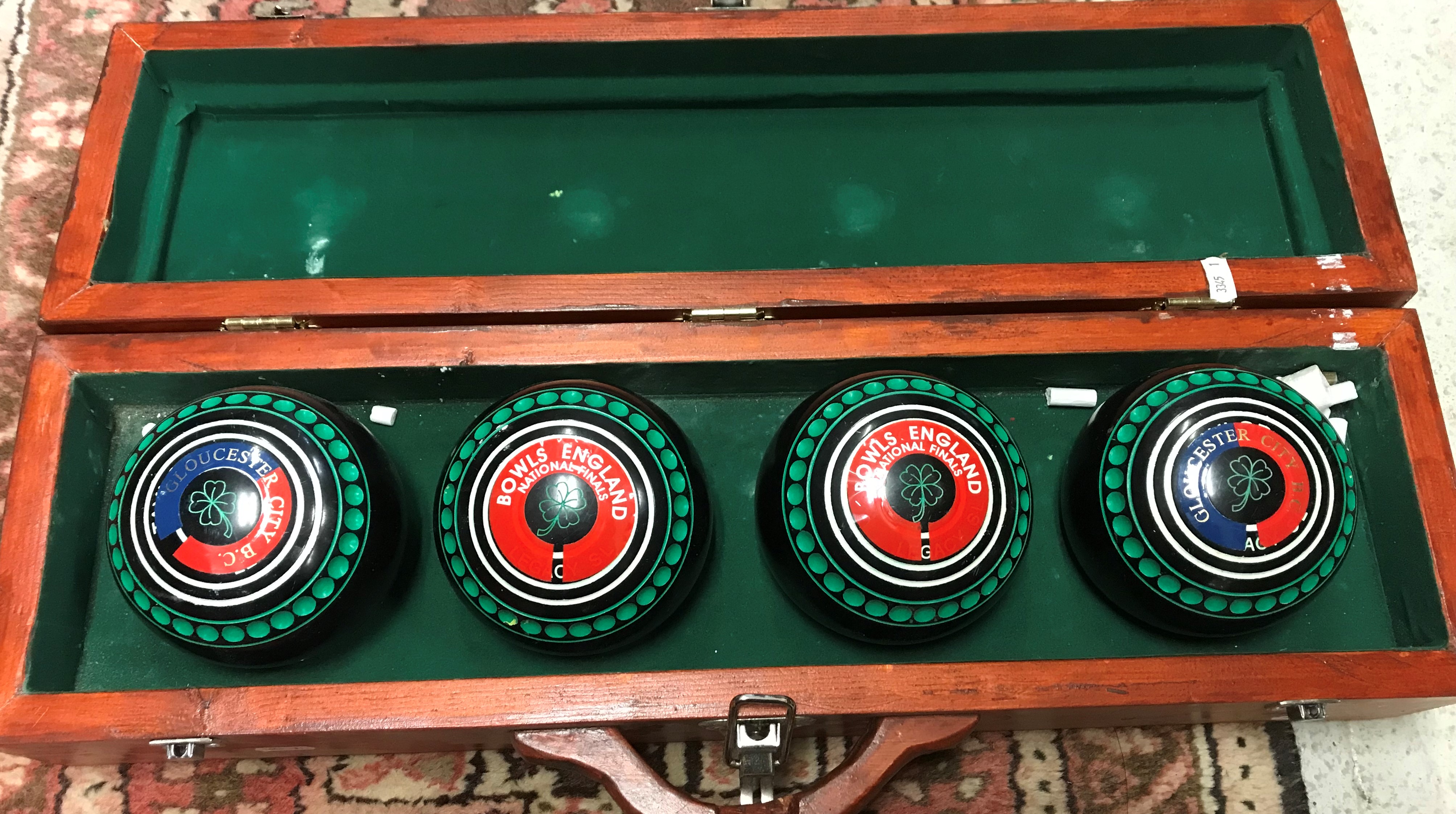 A set of four Thomas Taylor wood bowls,