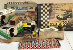 A collection of various Scalextric inclu