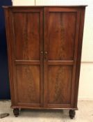 A 19th Century mahogany wardrobe, two tw