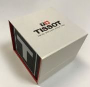 A Tissot Bridge Sport watch, together wi