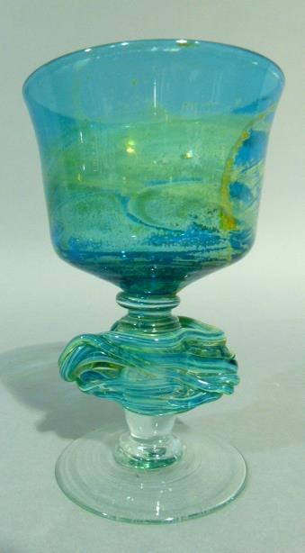 A Mdina large glass goblet of blue, green and yellow colour, the inverted bell shaped bowl on a