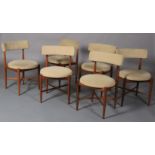 G Plan, a set of six teak dining chairs, pale corduroy upholstered bar back and circular seats, on