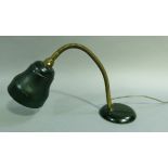 A universal desk lamp with black enamelled shade on adjustable gilt coiled column and black