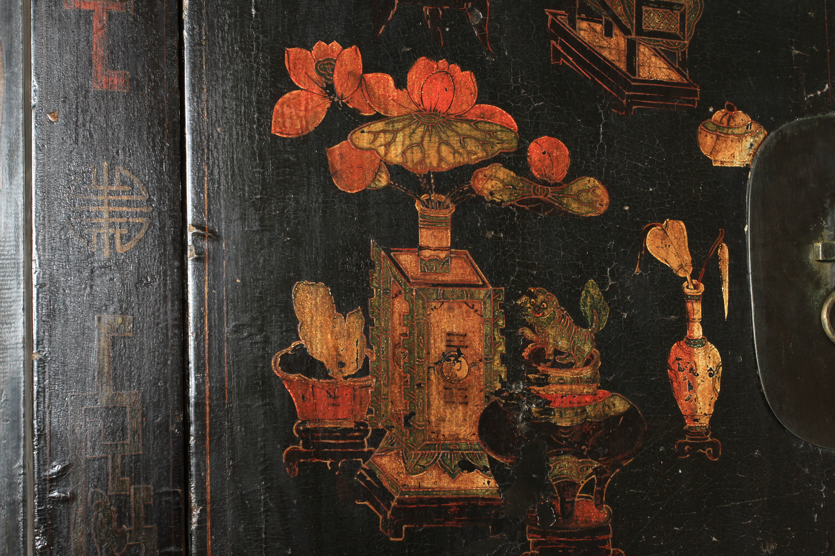 A Chinoiserie ebonised cabinet having two doors above a panel decorated with archaic symbols, the - Image 3 of 11