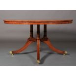 A figured burr walnut breakfast table crossbanded and chevron strung circular with radiating