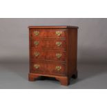 Jan Smith Reproductions of Brighton A George III style burr walnut cupboard with hinged top and