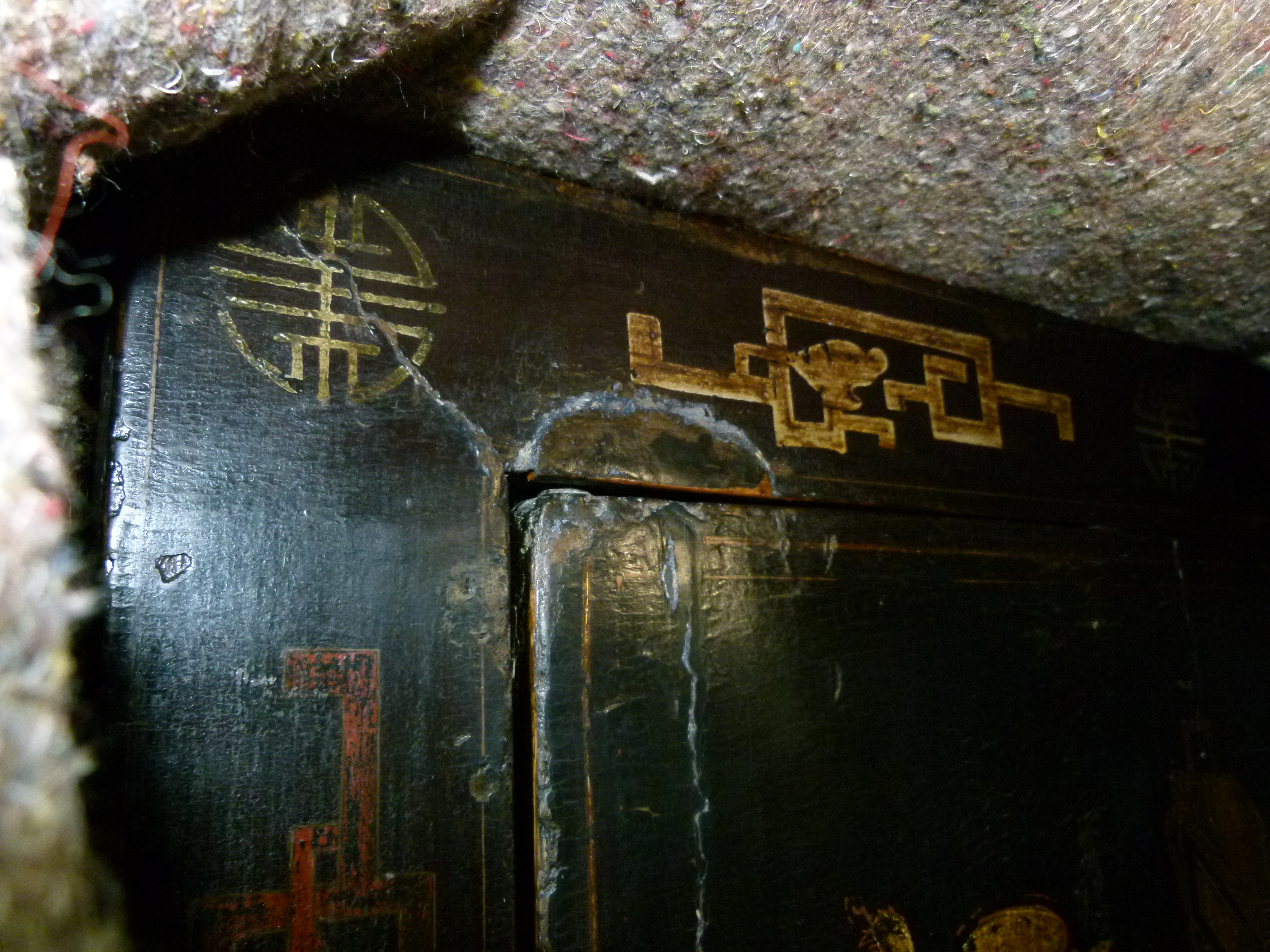 A Chinoiserie ebonised cabinet having two doors above a panel decorated with archaic symbols, the - Image 8 of 11