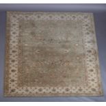 A Zeigler style carpet in pale olive within an ivory main border, 261cm x 351cm