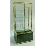 Renato Zevi, Italy c.1970s, a gilt metal open frame display cabinet with glass shelves above three
