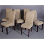 A set of six dining chairs by Oka, oatmeal upholstered back and seats, on dark stained square legs