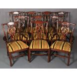 A set of ten hardwood dining chairs of mid 18th century design, having a striped velvet and flat