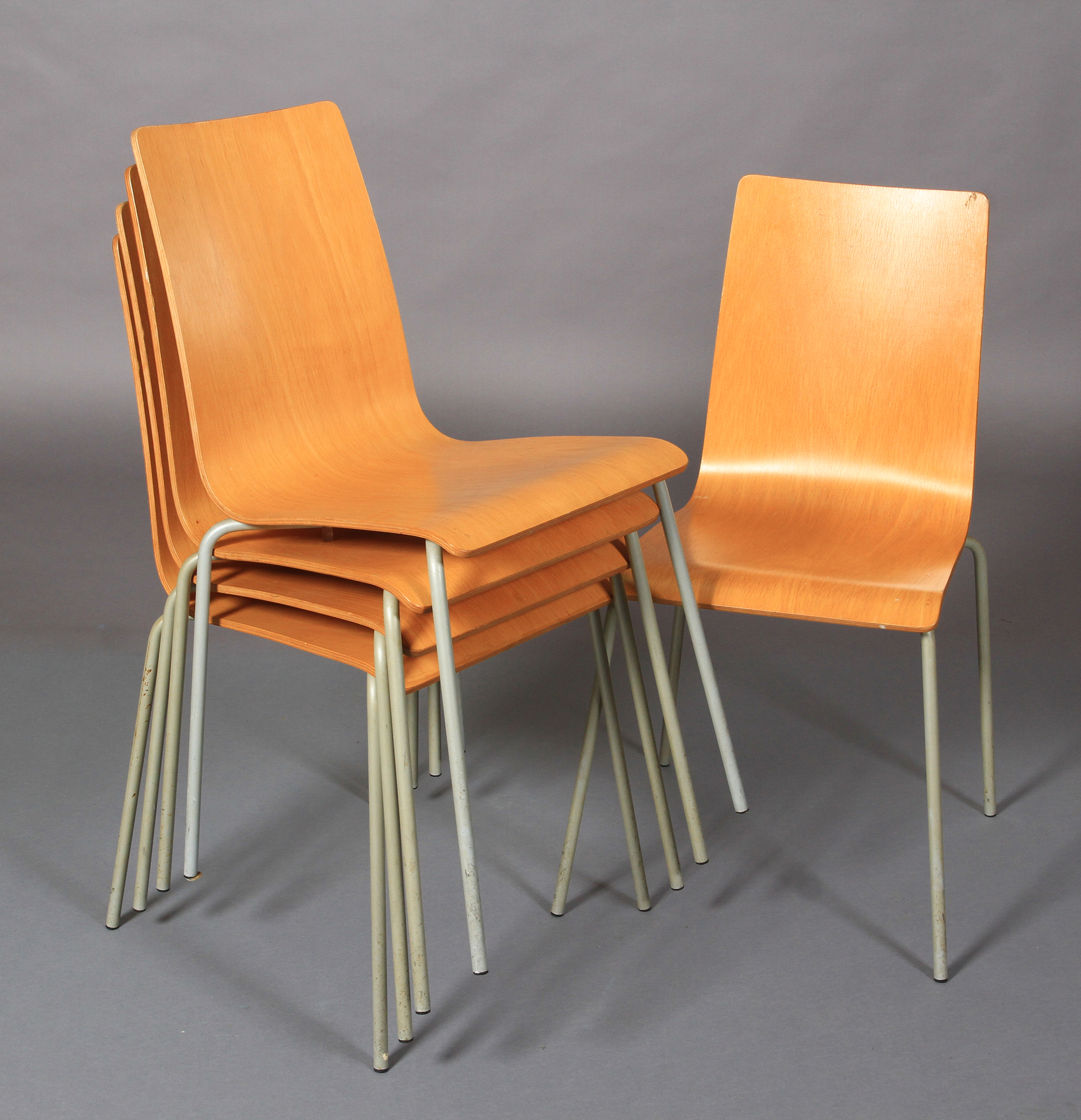 A set of five beech laminate stacking chairs on pale grey tubular legs - Image 2 of 2