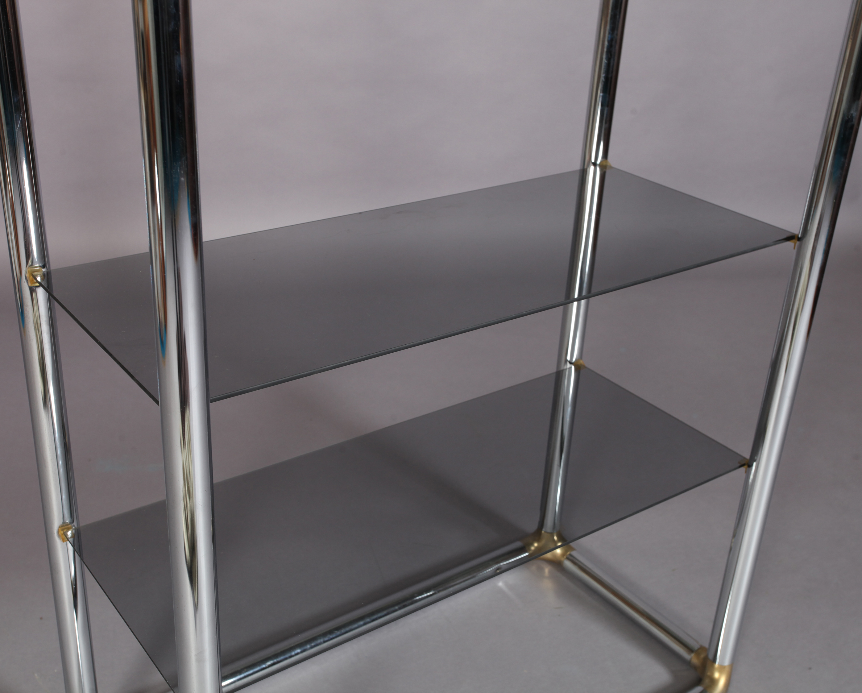 A chrome and gilt metal display stand with three smoked glass shelves, 84cm wide x 41cm deep x 183cm - Image 3 of 3