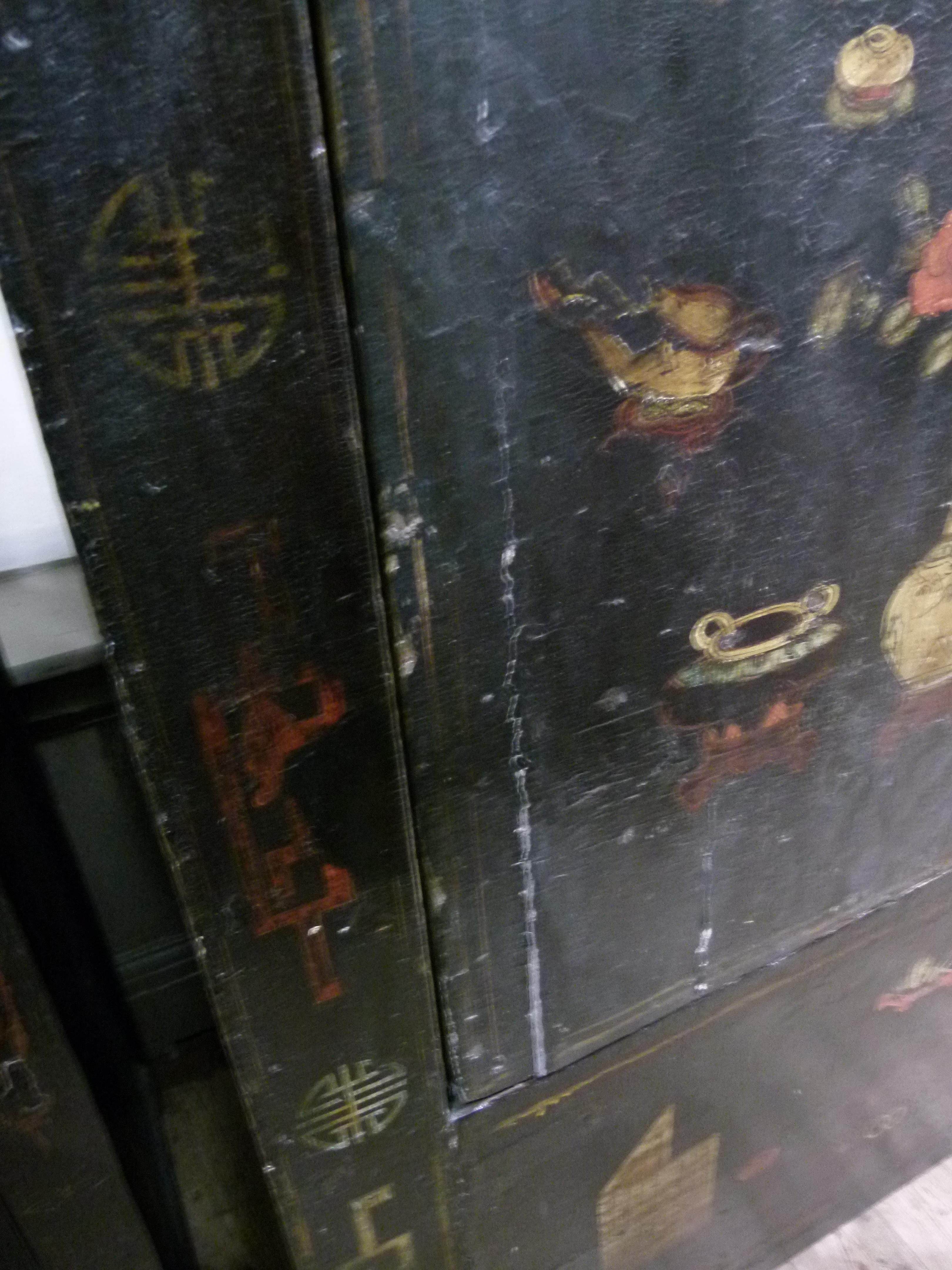 A Chinoiserie ebonised cabinet having two doors above a panel decorated with archaic symbols, the - Image 11 of 11