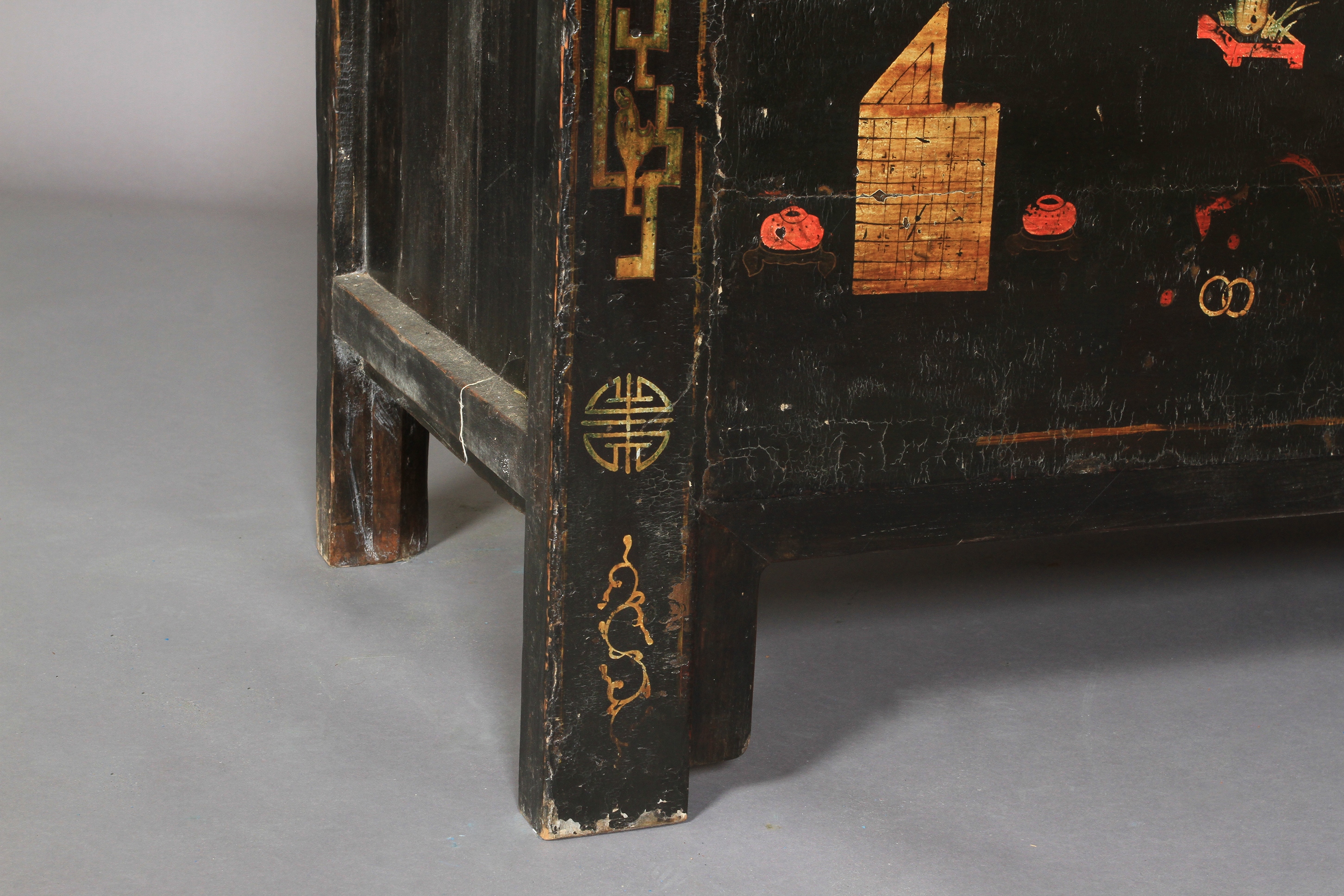 A Chinoiserie ebonised cabinet having two doors above a panel decorated with archaic symbols, the - Image 4 of 11