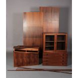 H G Furniture, Denmark c.1970's, a rosewood veneer wall mounting system comprising two rosewood wall