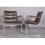 A pair of brown leather and tubular chrome cantilever armchairs c.1970/80s