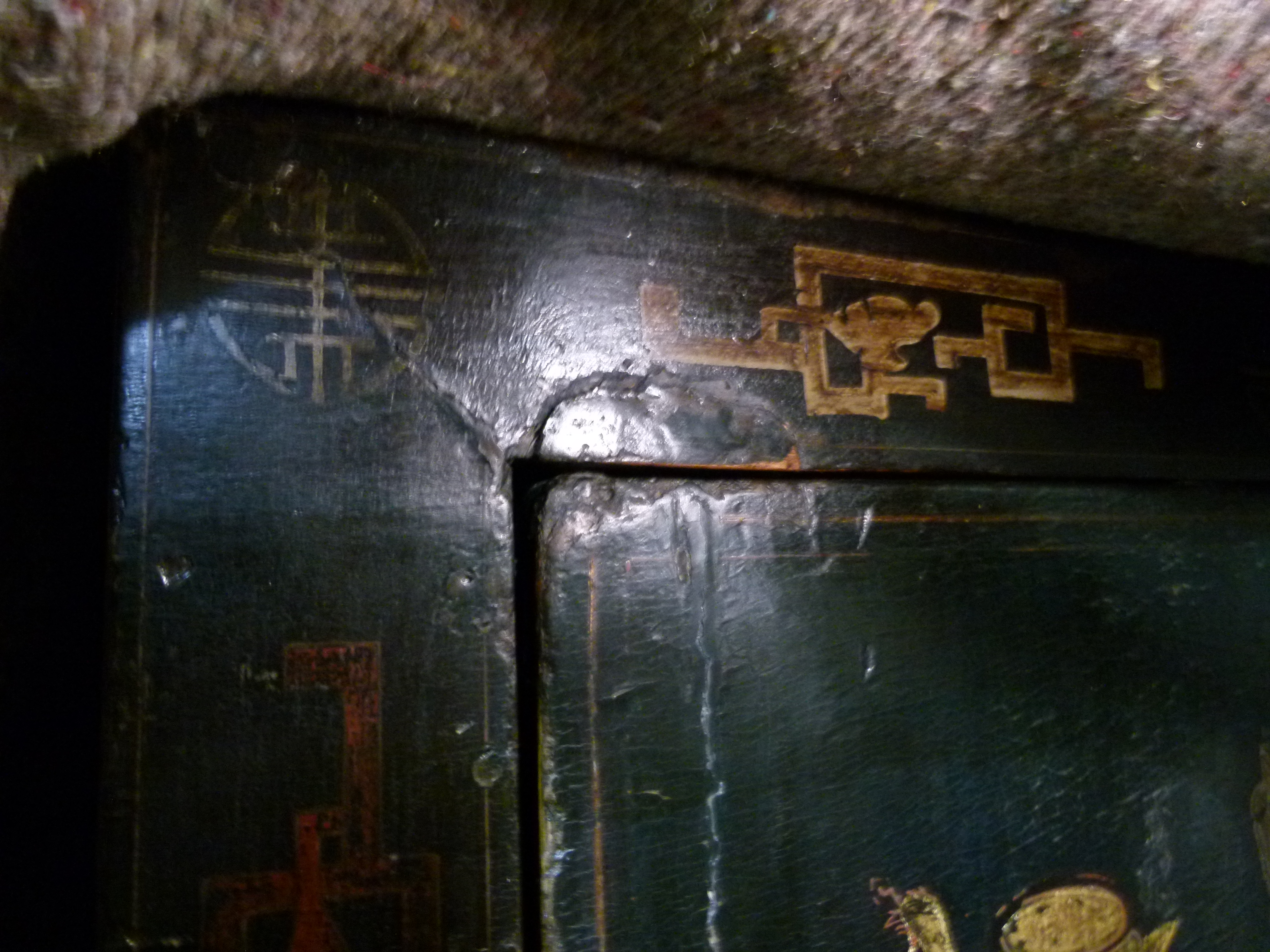 A Chinoiserie ebonised cabinet having two doors above a panel decorated with archaic symbols, the - Image 9 of 11