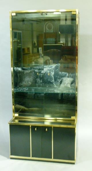 Renato Zevi, Italy c.1970s, a gilt metal framed and black laminate cabinet having two smoked glass