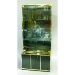 Renato Zevi, Italy c.1970s, a gilt metal framed and black laminate cabinet having two smoked glass