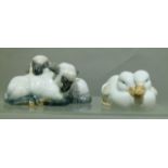 A Copenhagen porcelain model of two sleeping lambs, model 2769, 10cm wide, printed mark in green;