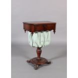 A Victorian walnut trumpet-shaped octagonal work table with carved collar on three foliate carved